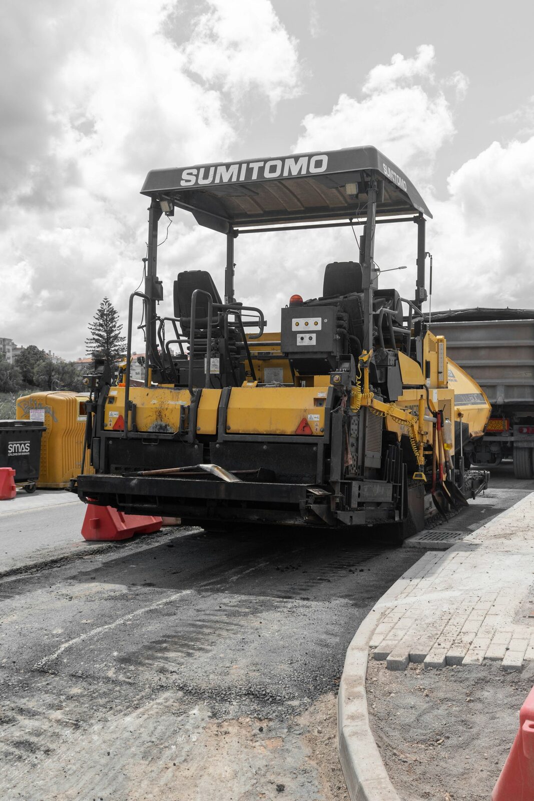 New asphalt meeting a finished paver border